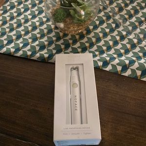 Nuface fix line smoothing device